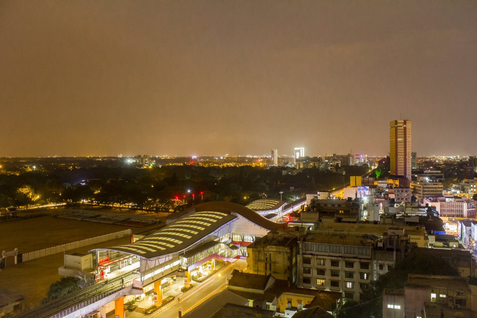 MG Road Metro station and Bengaluru city centre at night, Karnataka